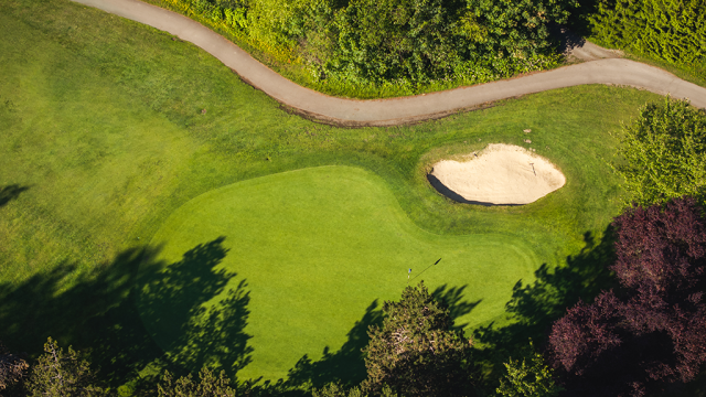View of cart path and bunker